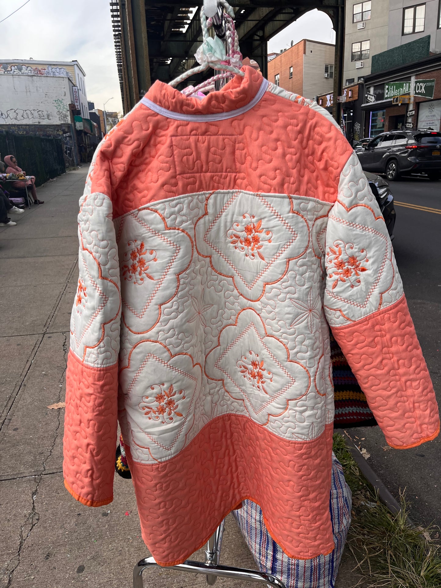 Coral and white quilted jacket